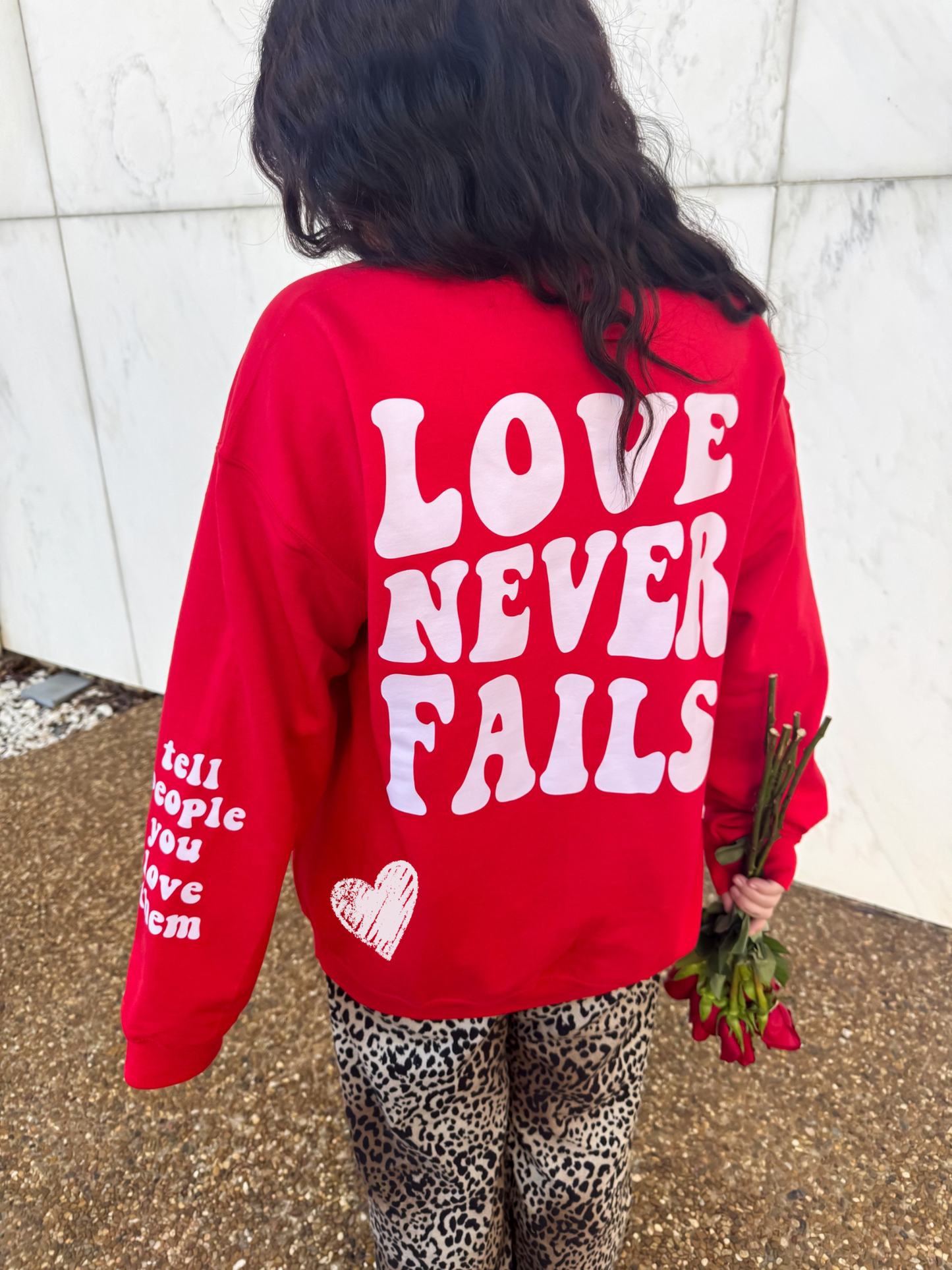 Love Never Fails Sweatshirt